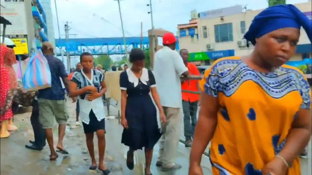 People walking around Kongowea market
