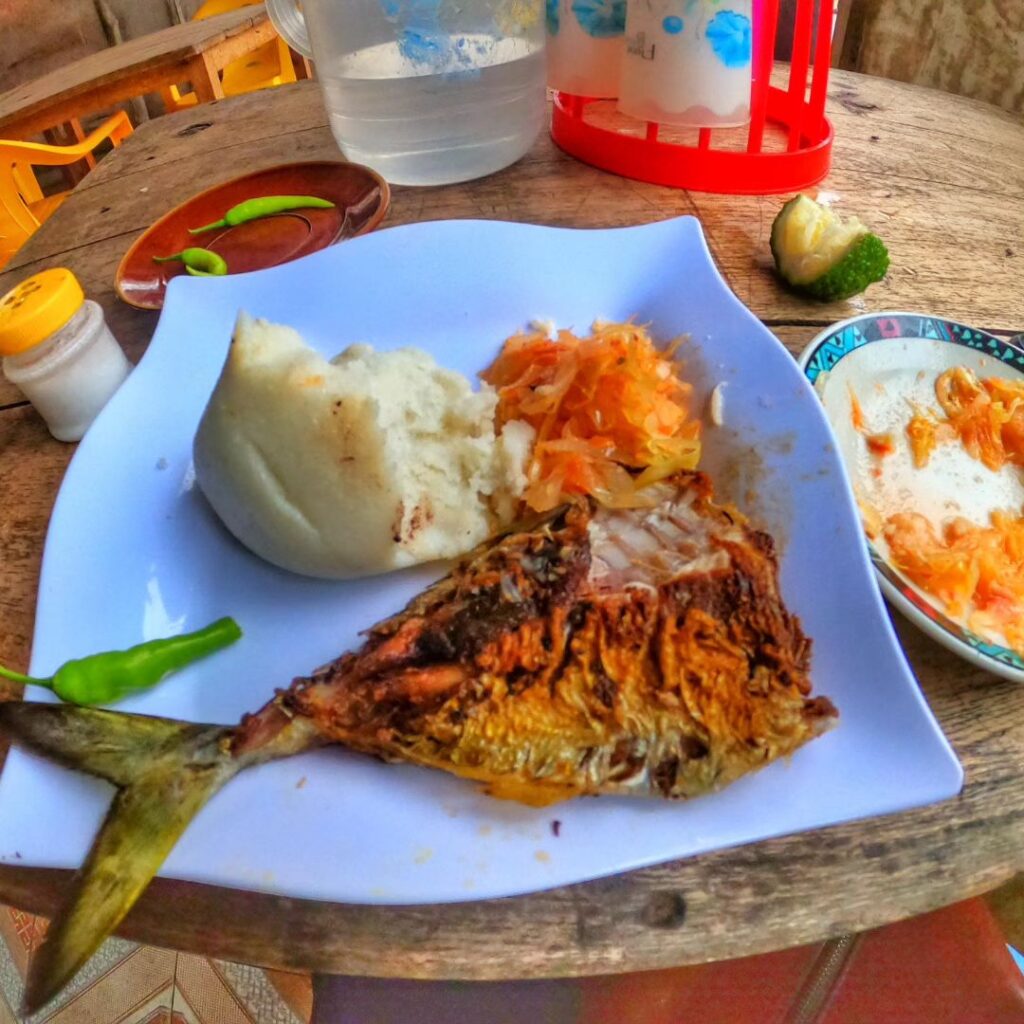 Ugali with fish in a plate - Mombasa dish