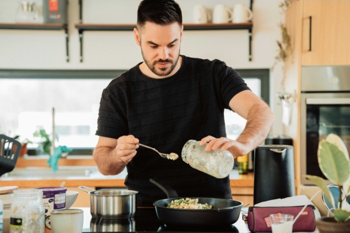 A man cooking alone 