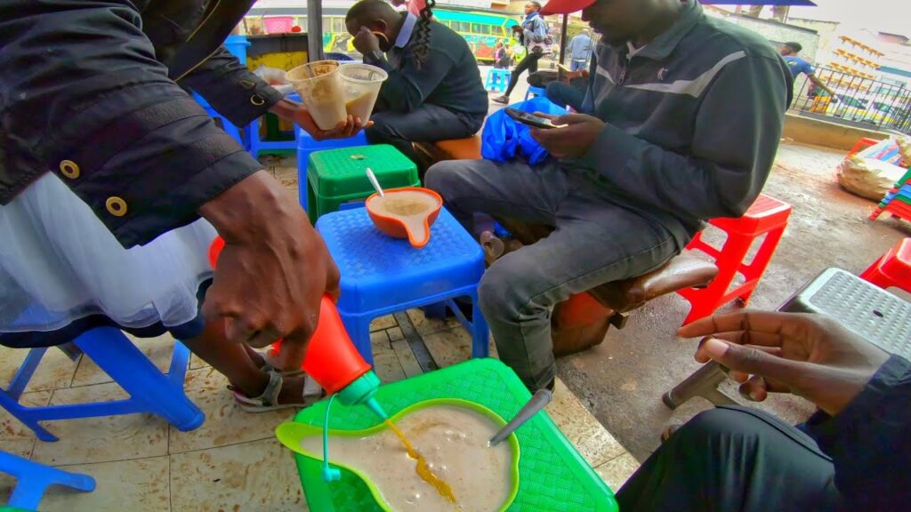 An image showing the author trying Uji Power in Nairobi