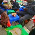 An image showing the author trying Uji Power in Nairobi