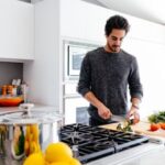 A man cooking in an Airbnb