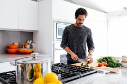 A man cooking in an Airbnb