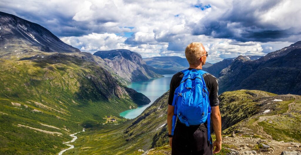 A man enjoying the view of the mountains