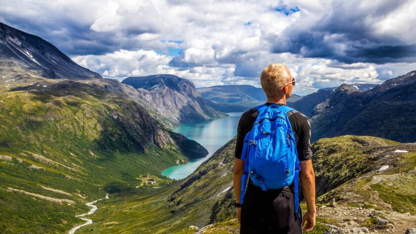 A man enjoying the view of the mountains