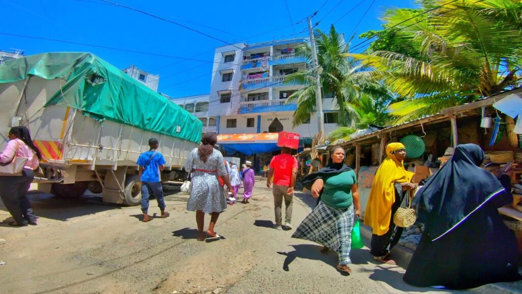 People walking along biashara streets in Mombasa Raha 