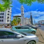 The streets of Mombasa town along Digo road, a view of a car and a mosque