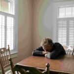 A man sitting alone stressed