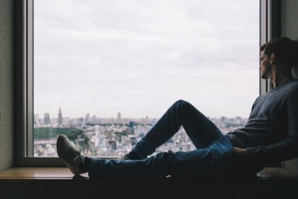 A man sitting on the window